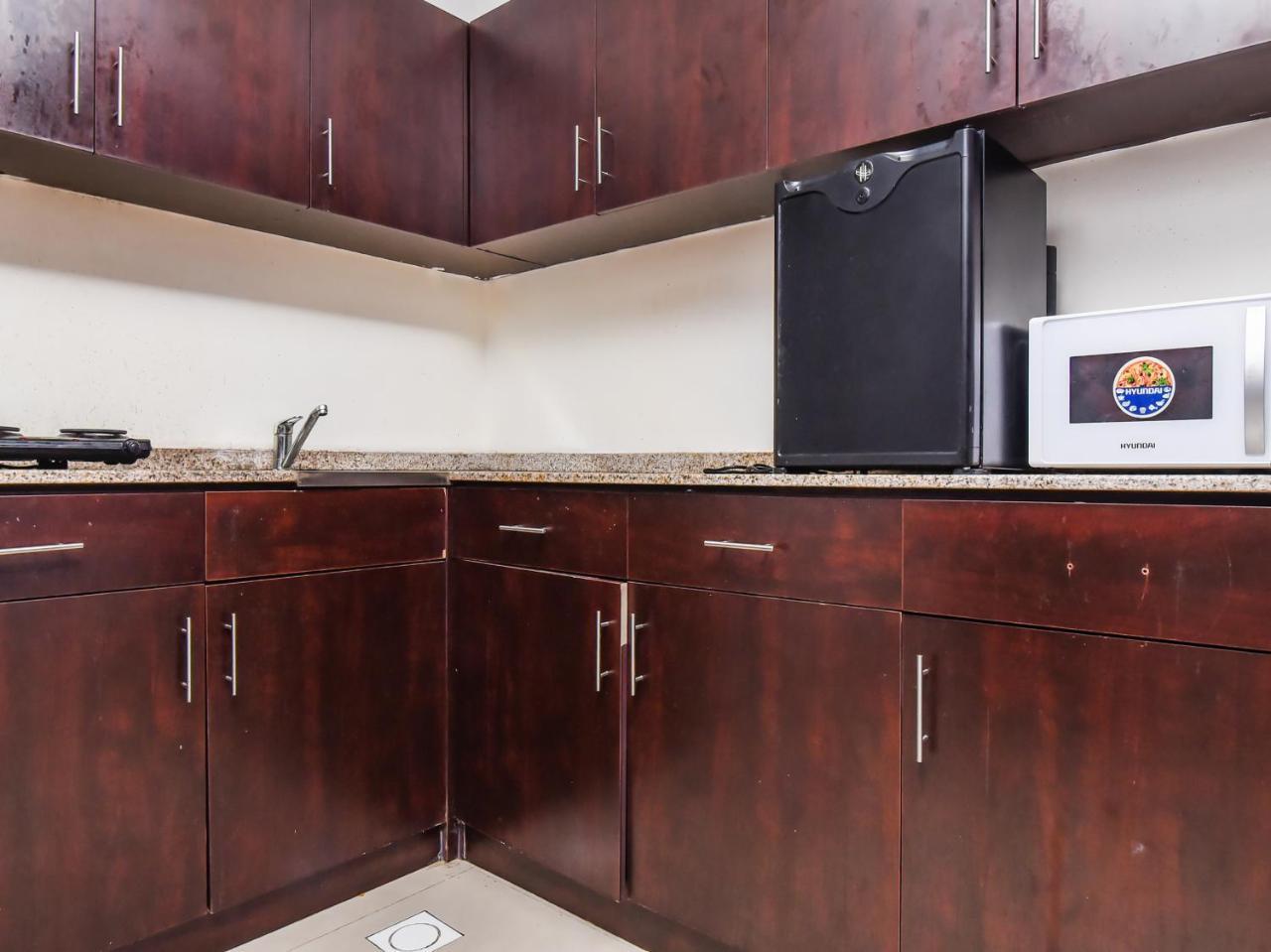 Oyo 138 Empire Hotel Apartments Дубай Екстериор снимка